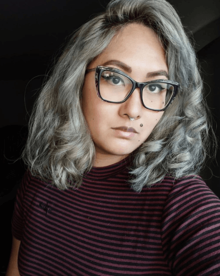 Female model with arctic gray pigmented hair