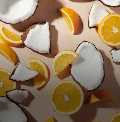 sliced coconuts and oranges
