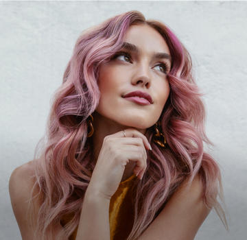Blonde woman with dyed pink hair