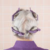 Back of woman's head with clips holding hair up in four sections thumbnail