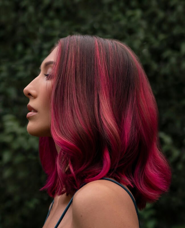 Side profile of woman with beautiful hair highlights
